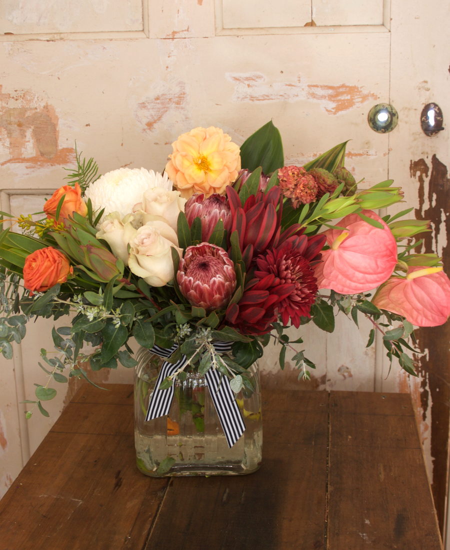 Seasonal Flowers with Natives in Glass Vase