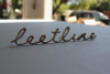 41-48 Chevy Passenger Car Fleetline Script Rear Trunk Deck Lid Emblem New