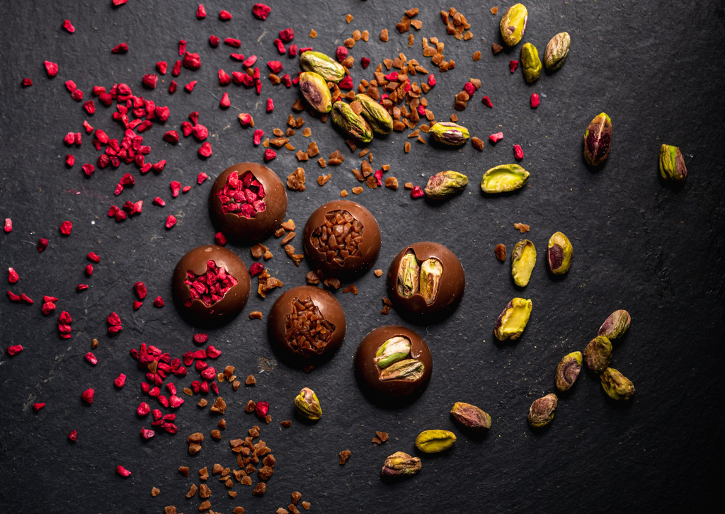 Milk Chocolate Moments. Pistachio, Toffee and Raspberry Crumb