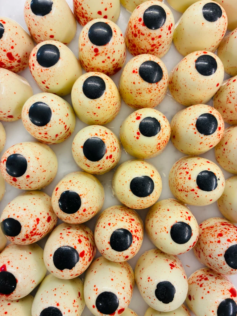 Spooky eyes with filled raspberry caramel