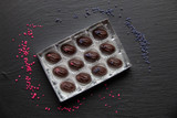 6 Rose & 6 Violet Dark Chocolate Fondant Creams.  (Not suitable for Vegans)