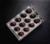 6 Rose & 6 Violet Dark Chocolate Fondant Creams.  (Not suitable for Vegans)