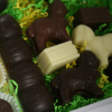 The Farmyard. Solid Chocolate ducks, eggs, sheep, bales and BookWorm