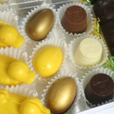 The Farmyard. Solid Chocolate ducks, eggs, sheep, bales and BookWorm