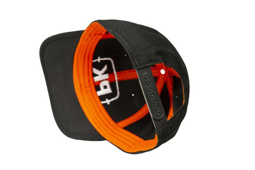 PK Logo Hat Black, back view of a black and orange snapback cap with the PK logo on the interior underside of the brim.