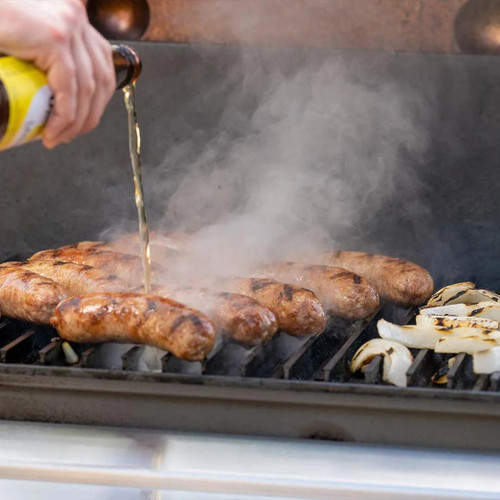GrillGrate® for The Original & PK300 Grill, cooking sausages and onions on a barbecue grill with steam and grill marks visible.