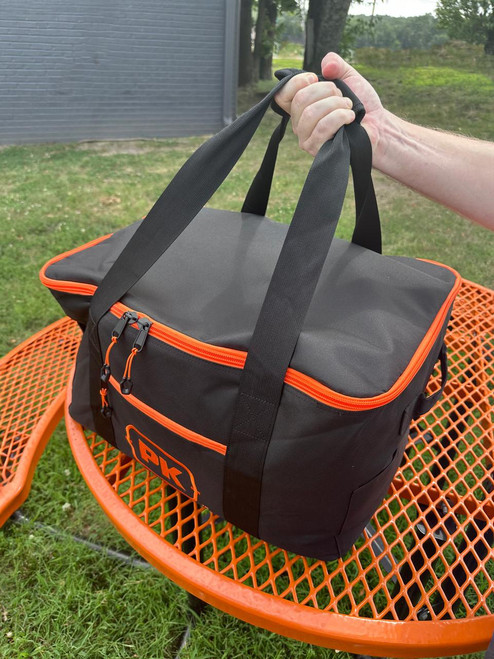 PK Grills PKGO Carrying Bag, a black and orange insulated carry bag for portable grill, with sturdy handles and zipper closures.
