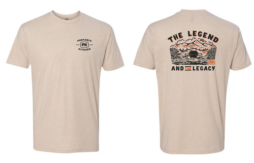 PK Grills PK Legend Tee, beige T-shirt with graphic design and text, featuring landscape illustration and branding.