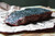 Hardcore Carnivore - Black Seasoning, raw steak with black seasoning on top, ready to be cooked, on parchment paper.