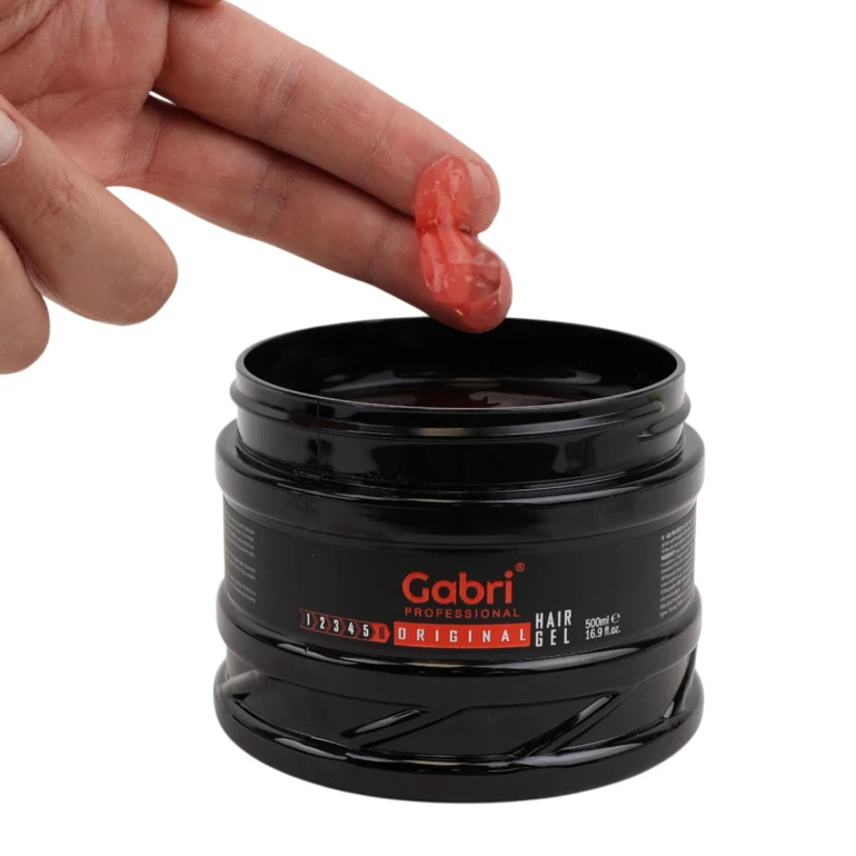 Gabri Professional Original Hair Gel 500ml, open jar showing red gel texture on fingers