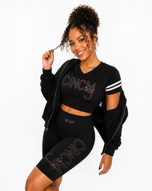 Shop the CINCY Reds Buttery Soft Biker Shorts featuring a sparkling rhinestone design, high-waisted fit, and ultra-soft stretch fabric. Perfect for Cincinnati game days, workouts, errands, and everyday comfort. Stylish, flattering, and made to move with you.