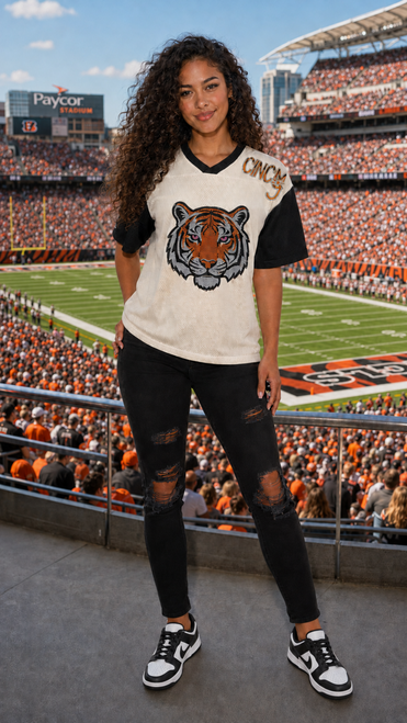 Turn heads on game day with our CINCY Rhinestone Mesh Jersey featuring a sparkling tiger design, breathable mesh fabric, and an oversized fit. The perfect Cincinnati-inspired football jersey for tailgates, stadium outfits, and everyday fan fashion