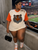 Turn heads on game day with our CINCY Rhinestone Mesh Jersey featuring a sparkling tiger design, breathable mesh fabric, and an oversized fit. The perfect Cincinnati-inspired football jersey for tailgates, stadium outfits, and everyday fan fashion