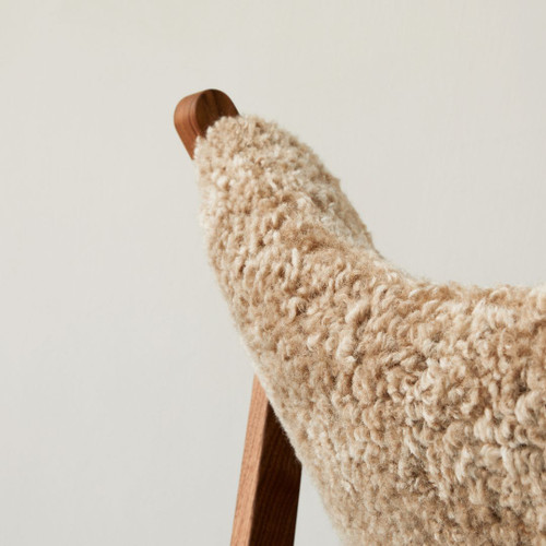 Audo Copenhagen Knitting Lounge Chair in Sahara Sheepskin with Walnut Base Sheepskin Detail