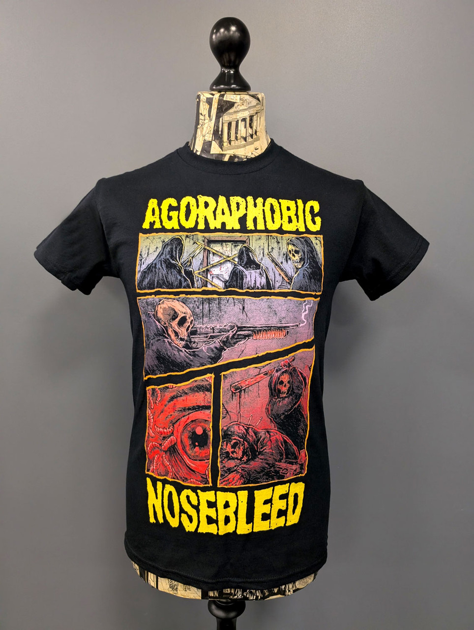 Agoraphobic Nosebleed 'Dark Comic' (Black) T-Shirt on a mannequin