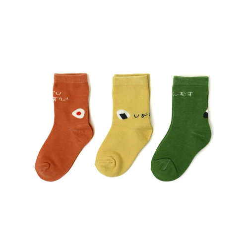 Stample Rolling Rice Balls Baby Crew 3Pack SS - Inspired by Japan’s beloved onigiri (rice balls), each pair features a unique food-themed motif — salmon, pickled plum, and seaweed — paired with cheerful colors that make dressing fun and easy.