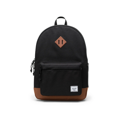Herschel Heritage Youth Backpack Saddle Brown - Redesigned for today with more space and made with EcoSystem™ recycled fabrics, this roomy, durable backpack transitions effortlessly from school to play with multiple pockets and comfortable padded shoulder straps for kids aged 8 – 12 years.