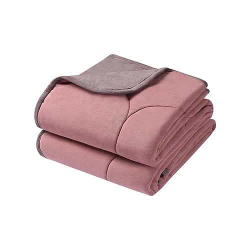 Nest Designs Winter Blanket 26FW Old Rose S/110 x 140cm - Our quilted blanket, made with soft bamboo jersey and Sorona® fill, delivers plush warmth without the weight.