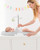 Comfortable and cushioned with a tuck-away toy bar