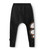 NUNUNU Extreme Bubbley Baggy Pants Black - When your kid is feeling extreme and wants the world to know it, these black gender neutral baggy pants are so it. We’ve added drippy, bubbly graffiti letters up the calf that scream “no,” just how your kid is probably feeling on the day they wear these.