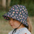 Bedhead Ponytail Bucket Sun Hat 24SS Lollipop - The Bedhead Ponytail Bucket hat is a UPF50+ kids sun hat featuring our unique 'anti-flop' technology ensuring brims won't flop in front of their eyes!