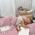 Gunamuna Nap Mat Mini Floral  - Gunamuna believes that little ones should be comfy no matter where they sleep, so they created a super gushy soft bamboo version with a genius zipper design to keep those littles tucked in.