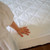 Naturepedic Waterproof Organic Mattress Pad 28" x 52" x 6" - Keep your toddler’s sleep space cozy and clean with an organic crib mattress pad crafted from soft, quilted cotton and GOTS-approved waterproofing.