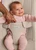 Babybjorn Bouncer Begin Woven - A lightweight, gentle bouncer for your first moments together.