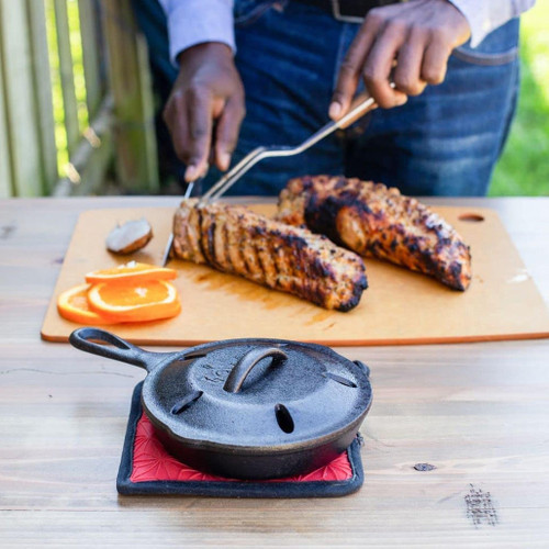 https://cdn11.bigcommerce.com/s-p82jn6co/images/stencil/500x659/products/18168/36724/60696-lodge-smoker-skillet-seasoned-cast-iron-6.5-in__25331.1687538879.jpg?c=2