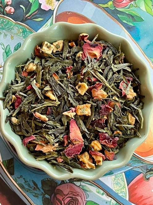 Rose Apple & Lychee Green Tea is a graceful blend of lush green tea, crisp apple, and the exotic sweetness of lychee. Fragrant rose petals add a floral elegance, creating a soft, romantic cup that's light, refreshing, and beautifully balanced.
A dreamy escape in every sip.

Why loose leaf tea?
Loose leaf tea holds more of what nature intended: fuller flavor, richer aroma, and the space to unfurl and release its true character in every cup. We honor that process and bring you tea that’s always extraordinary.

Our Commitment
At White Cloud Tea Company, we are devoted to offering only the freshest, most flavorful loose leaf teas. We believe that tea should be a sensory experience—vibrant, aromatic, and full of life. That’s why we source with care and blend with intention, using whole leaves, real botanicals, and no shortcuts

Steeping Instructions:
1 tsp per 8 oz | 140-185°F | Steep 1-3 min

Ingredients: green tea, apple pieces, rose petals, lychee flavor & rose flavor

Caffeine level- moderate




