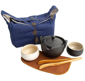 

The perfect tea set for two people to share tea away from home. It contains 1 teapot, 2 cups, 1 tea cloth, 1 set tea tongs (for handling the tea cups); all beautifully protected in a padded cloth travel bag. This set makes sharing tea a joy.

Teapot 4.25" W  X  3.43" H 

Cups 2.75" W X 1.56" H
