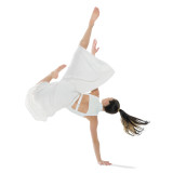 girl making salto in white dress