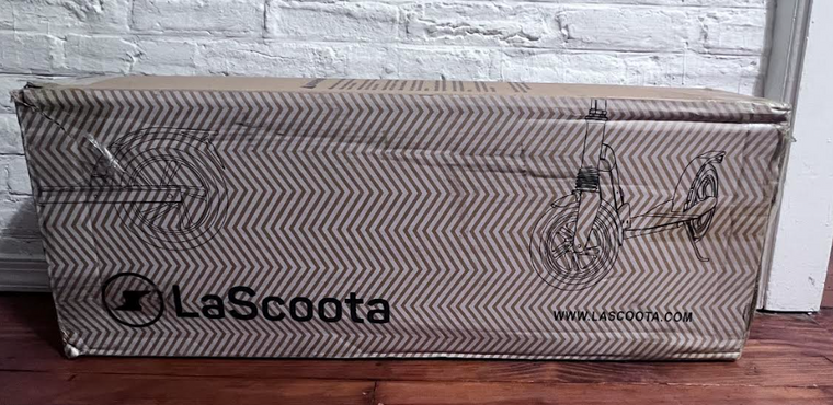 LaScoota Kick Scooter for Kids Ages 6+, Lightweight, Foldable, 220 lbs Max Load - $40