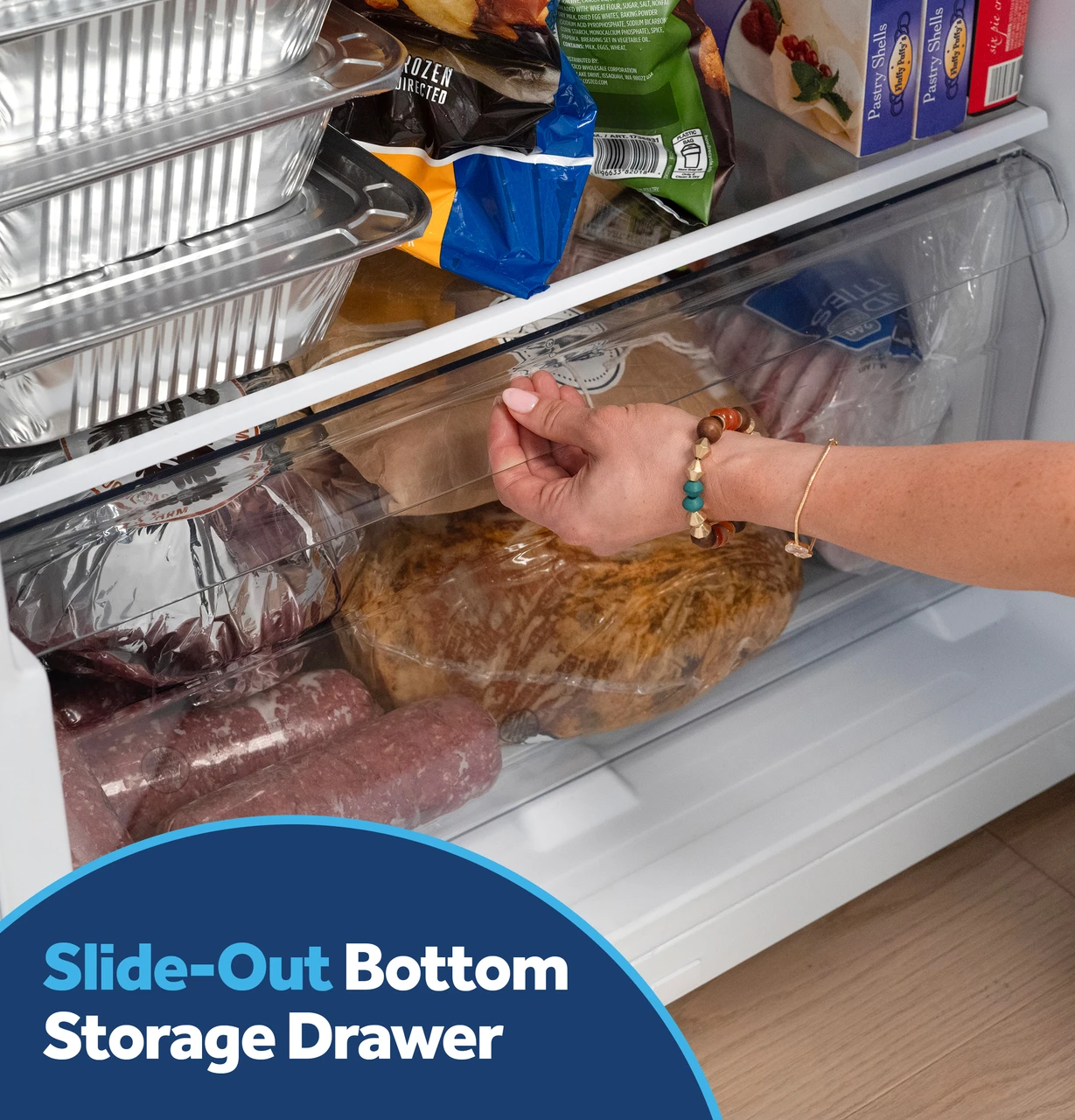12_GE_UprightFreezer_18.22Dbottomdrawerwithtalent_CROP_SlideOutDrawer.jpg