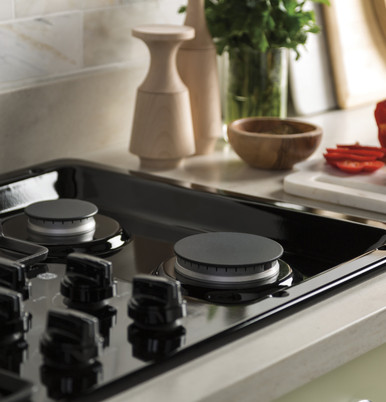 GE® 36" Built-In Gas Cooktop with Dishwasher-Safe Grates in Black size 4.75 H x 36 W x 21 D | JGP3036DLBB | Standard Cast