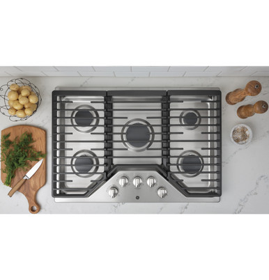 GE® 30" Built-In Gas Cooktop with 5 Burners and Dishwasher Safe Grates in Stainless Steel size 5.5 H x 30 W x 21 D | JGP5030SLSS | Heavy Cast