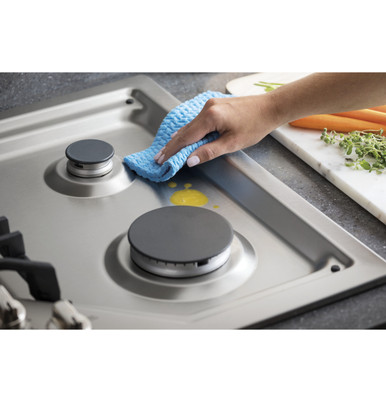 GE® 30" Built-In Gas Cooktop with 5 Burners and Dishwasher Safe Grates in Stainless Steel size 5.5 H x 30 W x 21 D | JGP5030SLSS | Heavy Cast