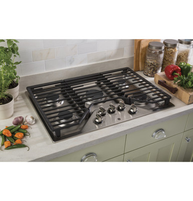 GE® 30" Built-In Gas Cooktop with 5 Burners and Dishwasher Safe Grates in Stainless Steel size 5.5 H x 30 W x 21 D | JGP5030SLSS | Heavy Cast