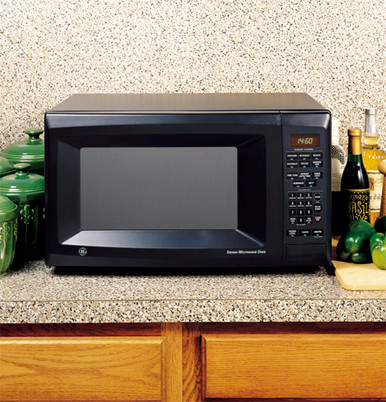 Haier Small Space Kitchen Appliances 1.4 Cubic Feet Over-The-Range  Microwave with Sensor Cooking