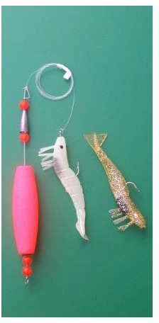 cigar looking sparkly fish with hooks DOA Deadly Combo Cigar Float 313 Clear/Gold Glitter