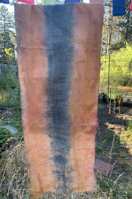 Peach color organic cotton scarf with blue strip down the middle