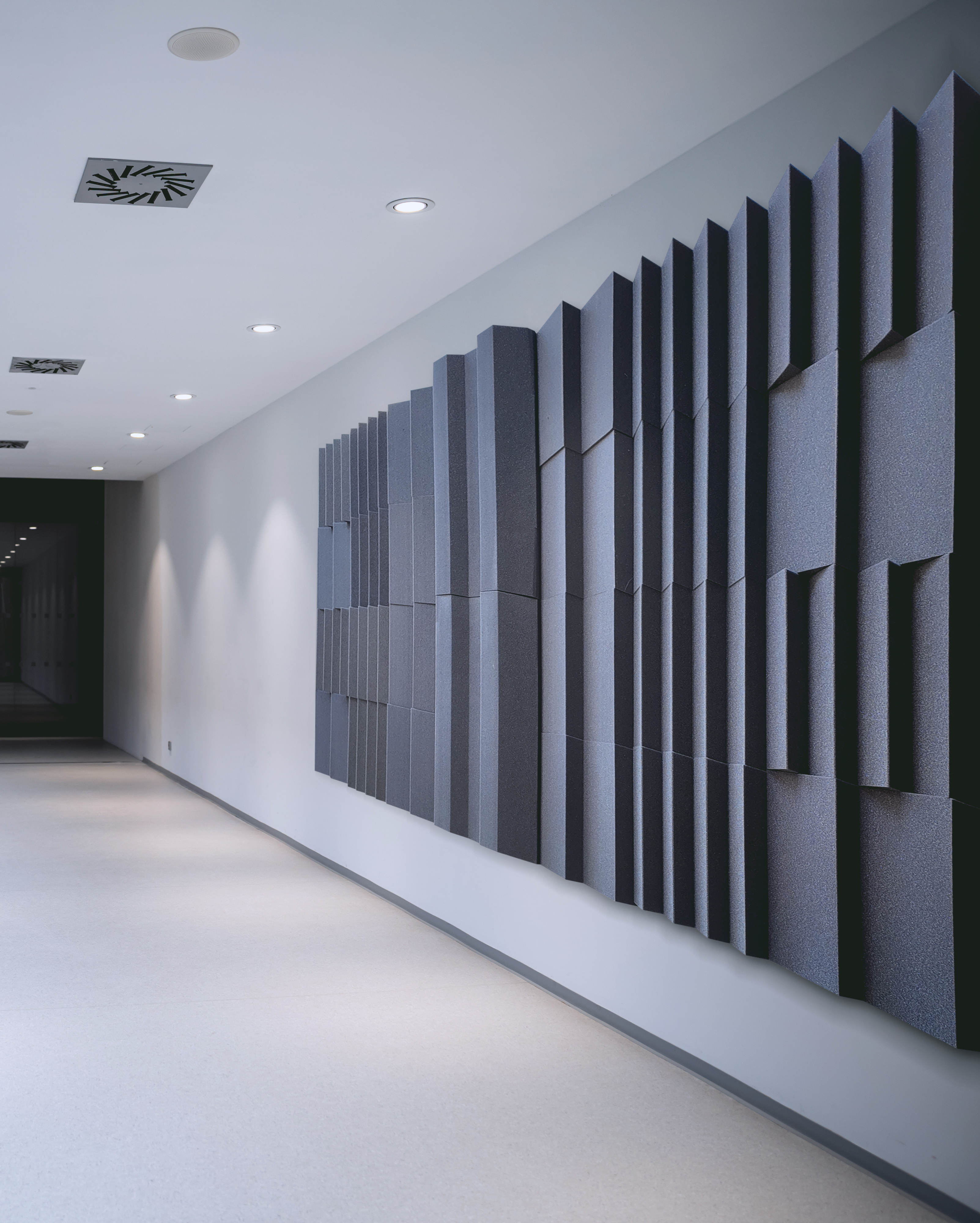 D24V Roominator&trade; Kit - (12) Charcoal&nbsp; DST-112&trade; panels, (12) DST-114&trade; panels, (2)  VersaTile&trade; mounted on wall - shown in Charcoal.