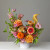 A vibrant, modern arrangement created in our signature artistic style. Our designers select the freshest premium blooms in bright, cheerful colors to craft a one-of-a-kind piece.

Flowers, container, and exact colors will vary from the photo, as each arrangement is uniquely designed based on the best seasonal stems available.

The overall look will remain bold, uplifting, and thoughtfully styled.