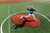 Portolite red two piece 10 inch pitching game mound.