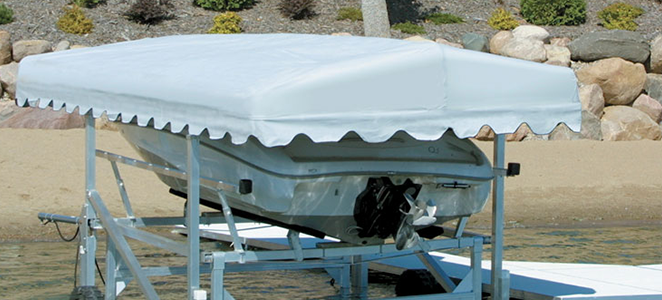 a boat with a cover on it sitting in the water