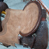 New Jackson Stock Saddle by Fort Worth Saddle Co with 13 inch seat.  Floral hand-tooling on skirt and pommel. Pencil roll with border tooled roughout seat and jockeys. Gullet size is 7.5 inch, weight is 27lbs, and skirt is 25 inch. Made in USA. Limited lifetime warranty.  S993