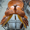 New Stock Saddle in Hermann Oak leather by Fort Worth Saddle Co with 13 inch seat. Pencil roll cantle, saddle strings with added hardware for storing gear. Gullet size is 7 inch, weight is 27lbs, and skirt is 25 inch. Made in USA. Limited lifetime warranty.

S994