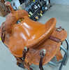 New Stock Saddle in Hermann Oak leather by Fort Worth Saddle Co with 14 inch seat. Round skirted lightweight trail saddle with extra rings & snap for hauling gear. Drop rigging on front and high pencil roll cantle for secure ride. Matching billets and flank cinch included. Gullet size is 6.75 inch, weight is 25lbs, and skirt is 23 inch. Made in USA. Limited lifetime warranty.

S995