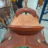 New Stock Saddle by Fort Worth Saddle Co with 15 inch seat. Handsome chestnut colored Jackson saddle with brass accents. Roughout seat and jockeys, drop rig front. Matching billets and flank cinch included. Gullet size is 7.5 inch, weight is 24lbs, and skirt is 26 inch. Made in USA. Limited lifetime warranty.

S996