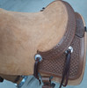 New Cutting Saddle by Fort Worth Saddle Co with 16 inch seat. Hermann Oak leather. Roughout contact points and skirt. Hand tooled rear chassis, cantle, and pommel. Gullet size is 7 inch, weight is 36lbs, and skirt is 28.75 inch. Made in USA. Limited lifetime warranty.

S1487